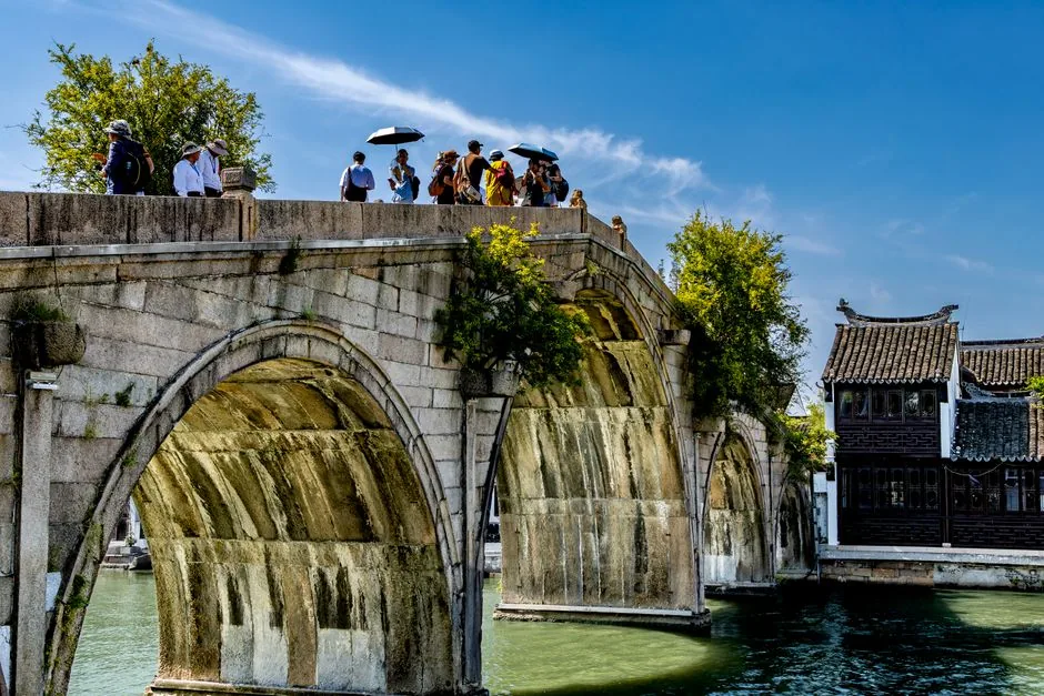 Zhujiajiao water town — canal boats and ancient stone bridges