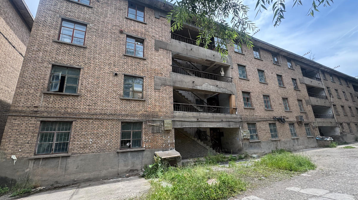 Abandoned childhood apartment building in China — ruined and empty after 20 years